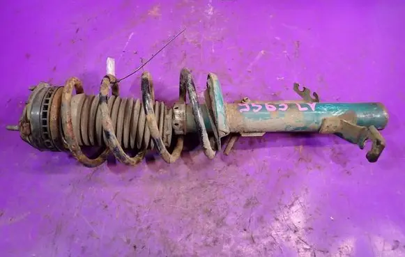Ford Fiesta Front shock absorber with coil spring 