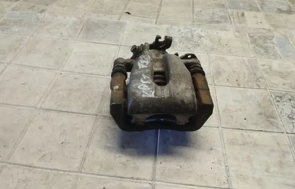 Subaru Forester SF Rear brake caliper