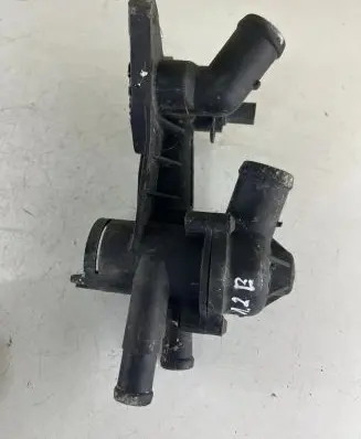 Thermostat/thermostat housing