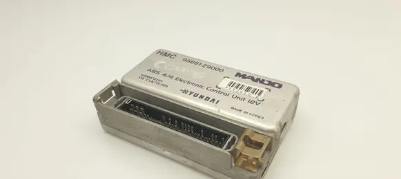 Hyundai Coupe ABS control unit/module 9566129000