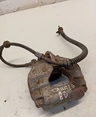 Volkswagen Touareg I Front brake caliper 7L6106D