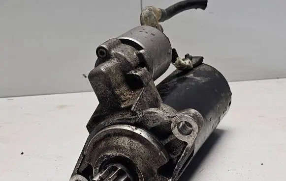 Volkswagen Touran I Starter motor 02E911023H 20070417 0001123011