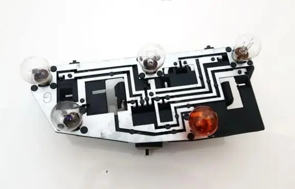Tail light bulb cover holder