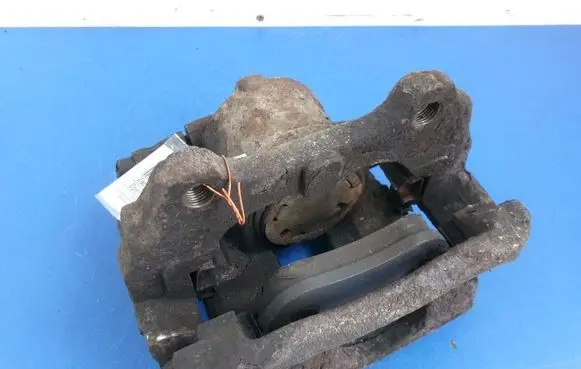 Opel Corsa D Front brake caliper