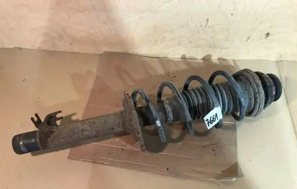 Front shock absorber with coil spring