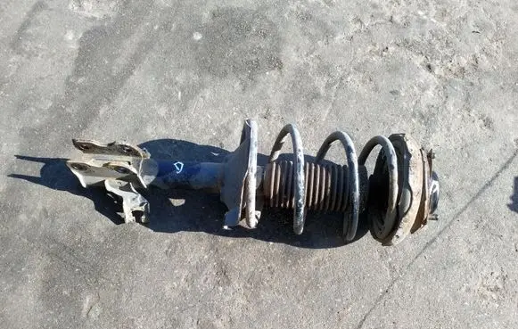 Nissan Almera Tino Front shock absorber/damper