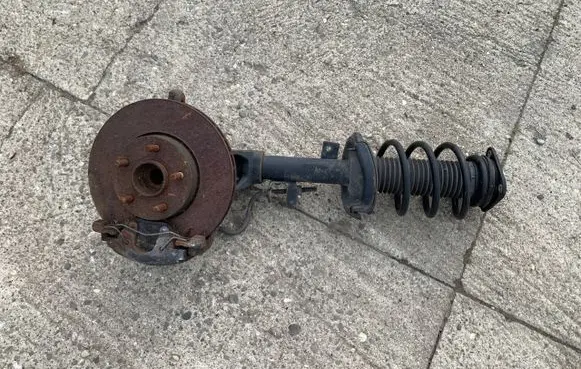 Ford Focus Front shock absorber with coil spring BV6118045ABC