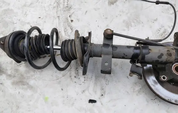 Renault Clio IV Front shock absorber with coil spring 