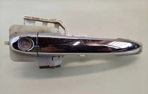 KIA Carens I Front door exterior handle