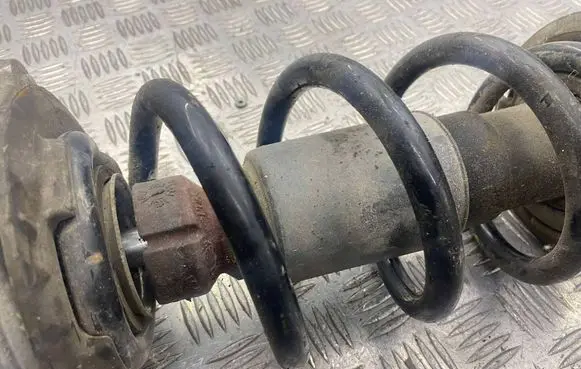 Audi A6 S6 C7 4G Front shock absorber with coil spring 4G0031M