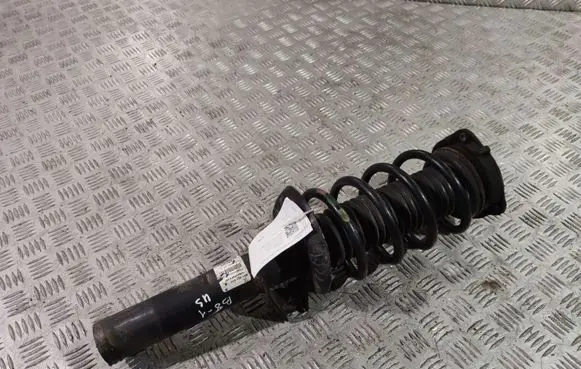 Volkswagen PASSAT B8 USA Front shock absorber with coil spring 561413031K