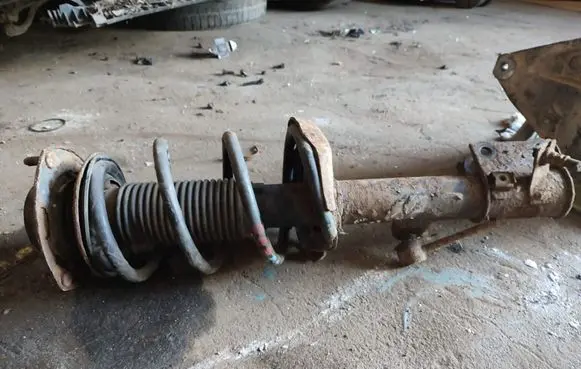 KIA Sportage Front shock absorber with coil spring