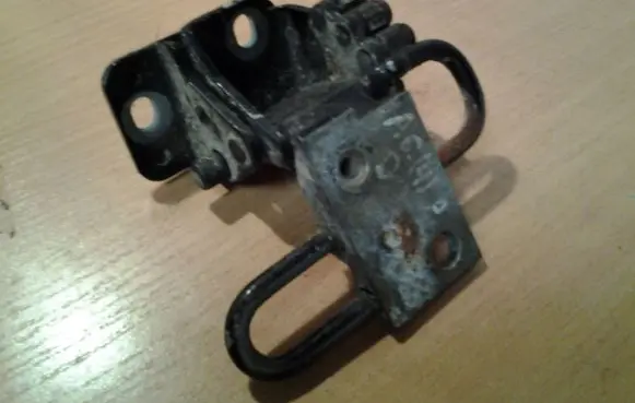 Front door lower hinge