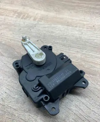 Mazda 3 I Air flap motor/actuator 8610000980 HB601B32J01