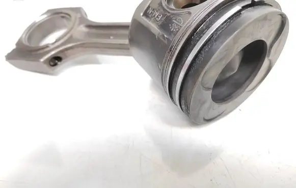 Piston with connecting rod