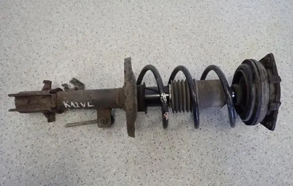 Nissan Micra Front shock absorber with coil spring 