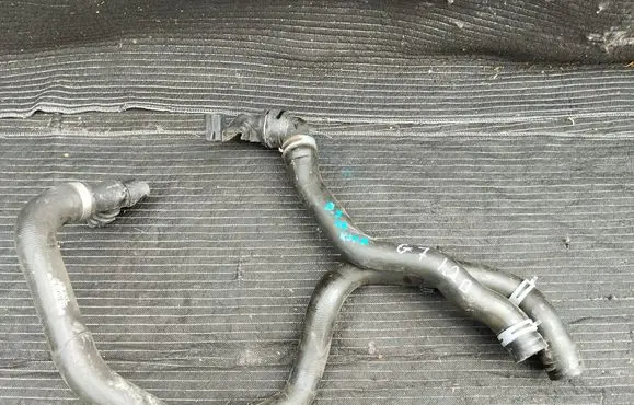 Volkswagen Golf VII Engine coolant pipe/hose 5Q0121049AC