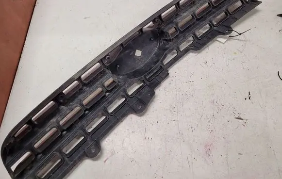 KIA Sportage Front bumper upper radiator grill 863501F030