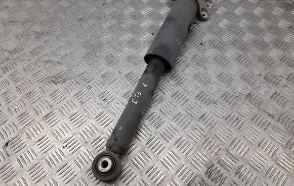 Cadillac CTS Rear shock absorber/damper 23172749