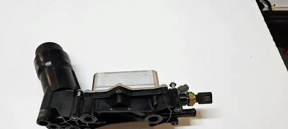 Oil filter mounting bracket