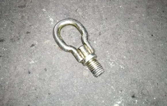Towing hook eye