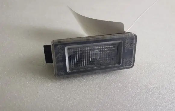 Nissan Qashqai J12 Number plate light 265108990E A045496