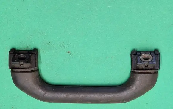Front interior roof grab handle