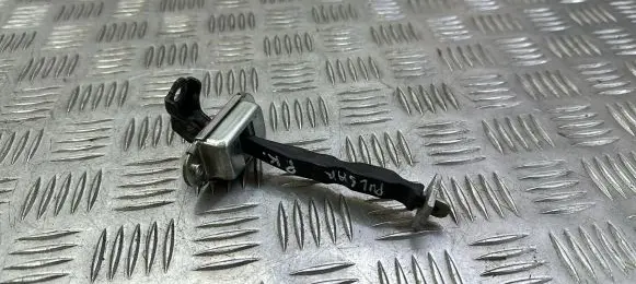 Nissan Pulsar Front door check strap stopper