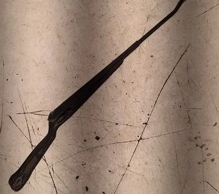 Front wiper blade arm