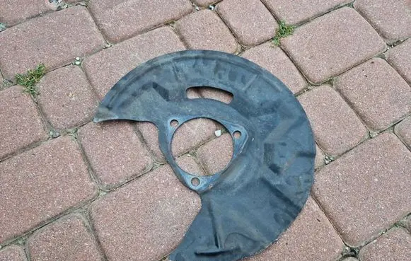 Opel Insignia B Front brake disc dust cover plate 22921538