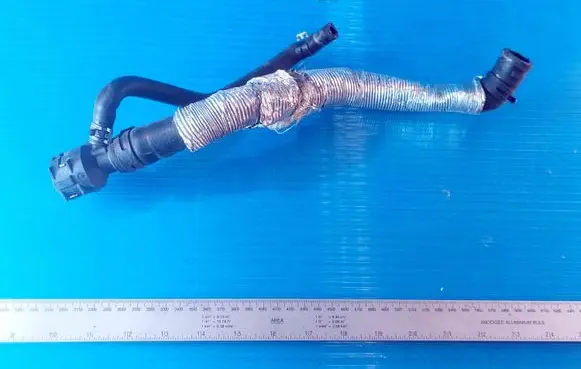 Skoda Octavia Mk2 (1Z) Engine coolant pipe/hose 1K0122157AN