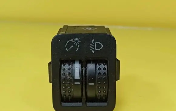 Headlight level height control switch