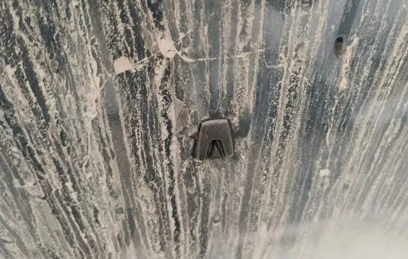 Windshield washer spray nozzle