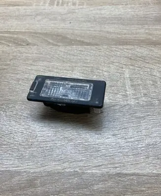Volkswagen Tiguan Number plate light 5N0943021 1K9943127A