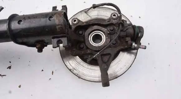Front wheel hub spindle knuckle