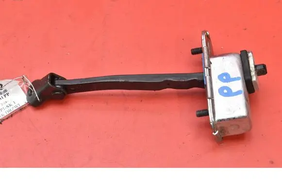 Front door check strap stopper