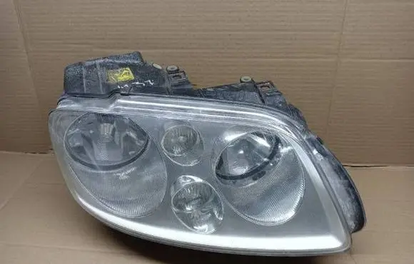 Volkswagen Touran I Headlight/headlamp 1T0941006D