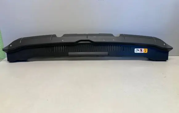 Engine bonnet/hood lock trim molding