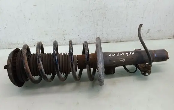 Front shock absorber with coil spring