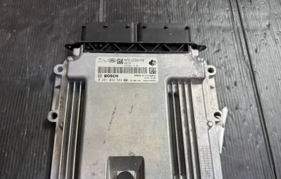 Land Rover Evoque I Engine control unit/module HX7312C520FFB 1039T05350 0281033584