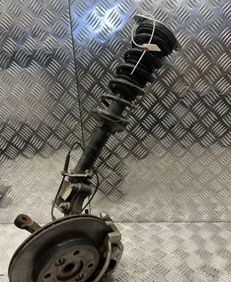 Dacia Spring Front shock absorber with coil spring