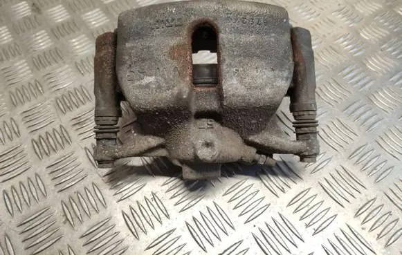 Volkswagen Golf VII Front brake caliper