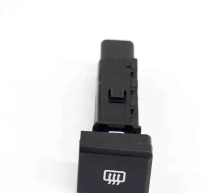 KIA Carens I Windscreen/window heater switch 