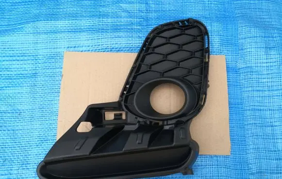 Mazda 3 II Front fog light trim/grill BGV450C21