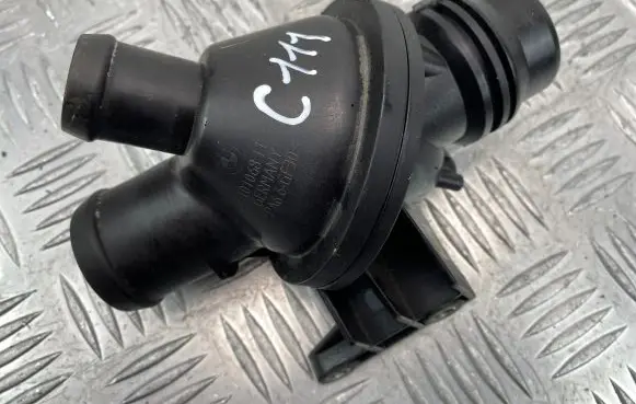 Thermostat/thermostat housing