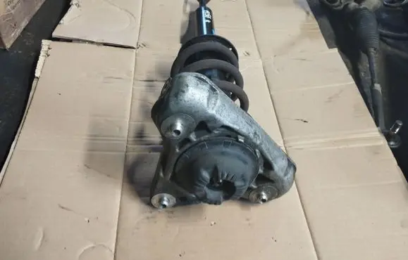 Front shock absorber with coil spring