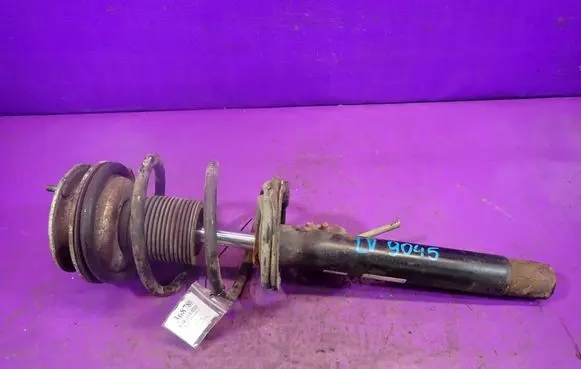 BMW 3 E46 Front shock absorber with coil spring 556867