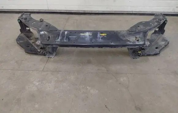 Top upper radiator support slam panel