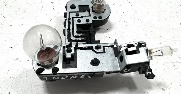 Volkswagen Touareg I Tail light bulb cover holder 7L6945260