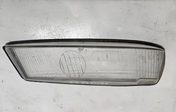 Opel Calibra Headlight lense 002137098 8R0460